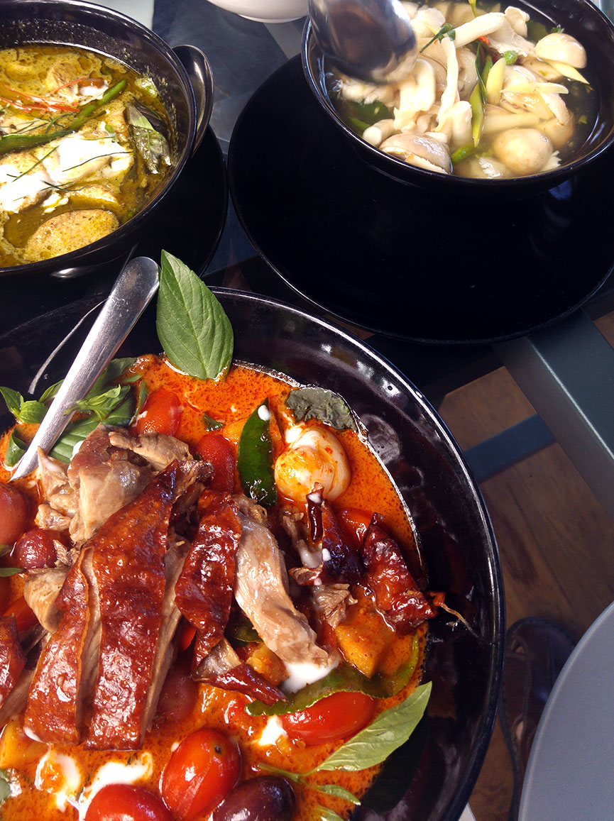 Curries and Tom Yum soup at The Neverending Summer.