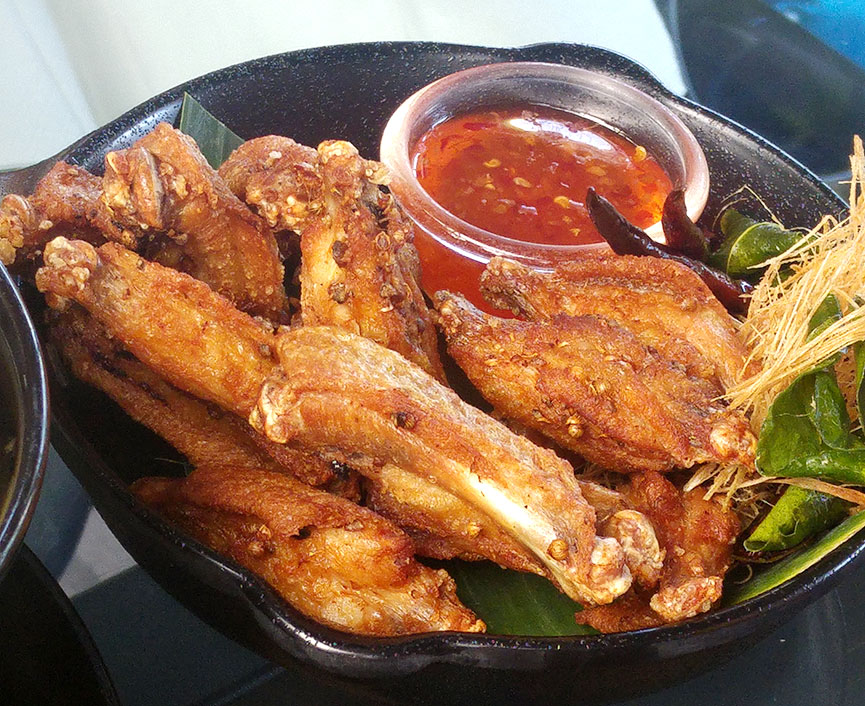 The Neverending Summer crispy chicken wings, sectioned in half for easy eating.