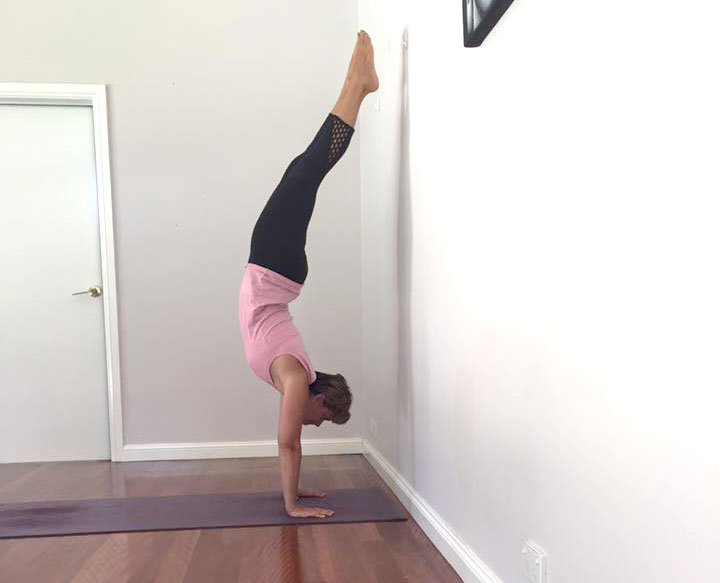 Setting fear aside and conquering a handstand.