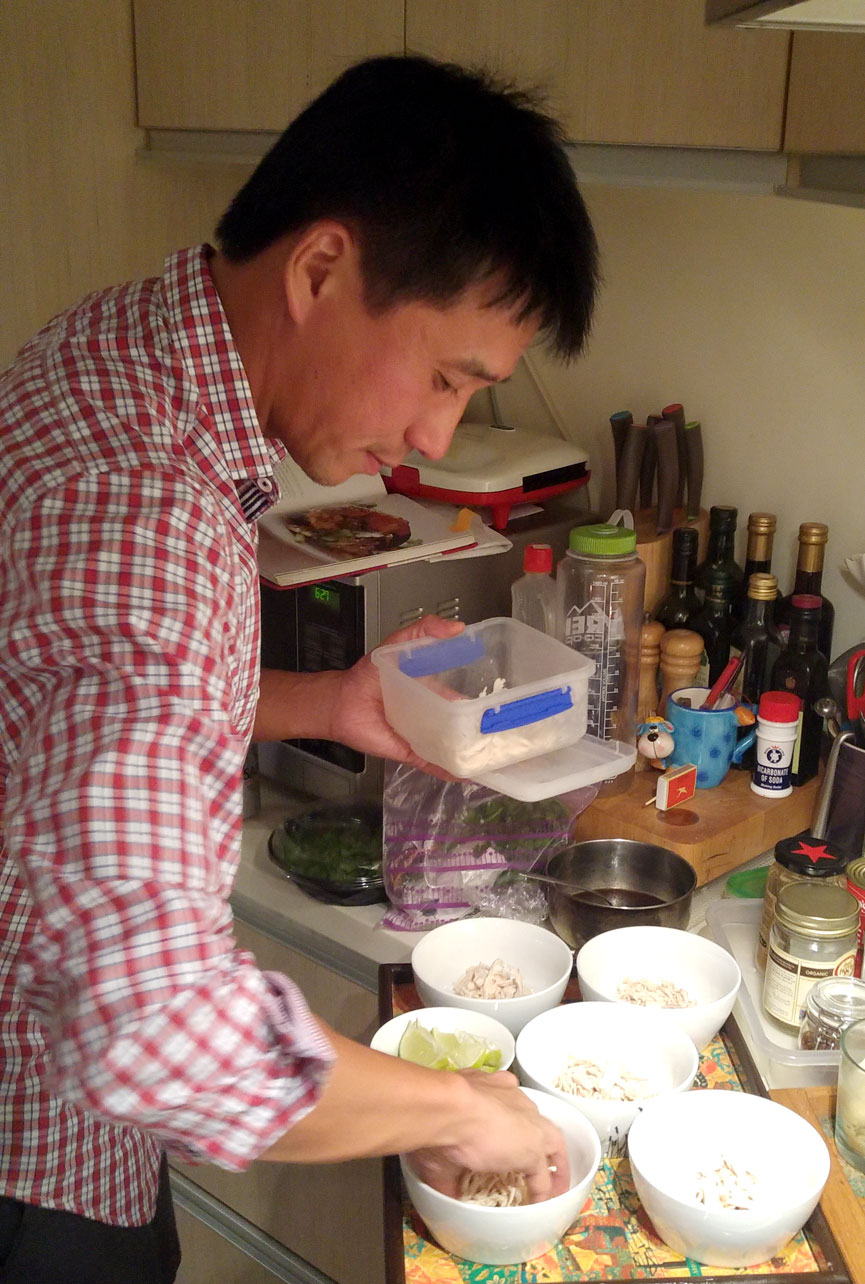 Ed plating up the Shredded Chicken and Lemongrass soup (there is not a coin in sight).