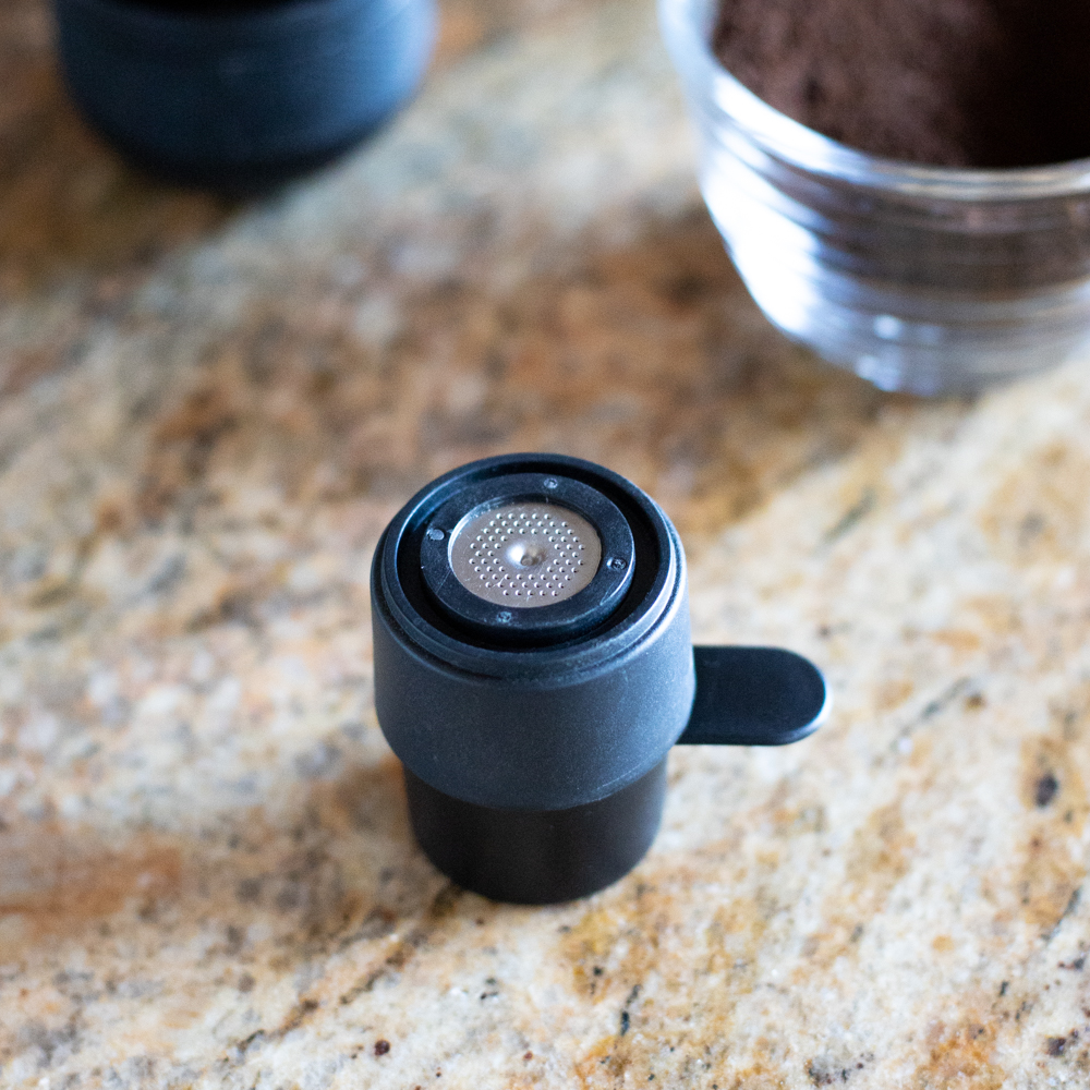 Wacaco Minipresso invert coffee filter on scoop