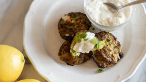 Follow Your Heart Vegenaise Garlic Aioli with Pea and Marinated Goat Cheese Fritters